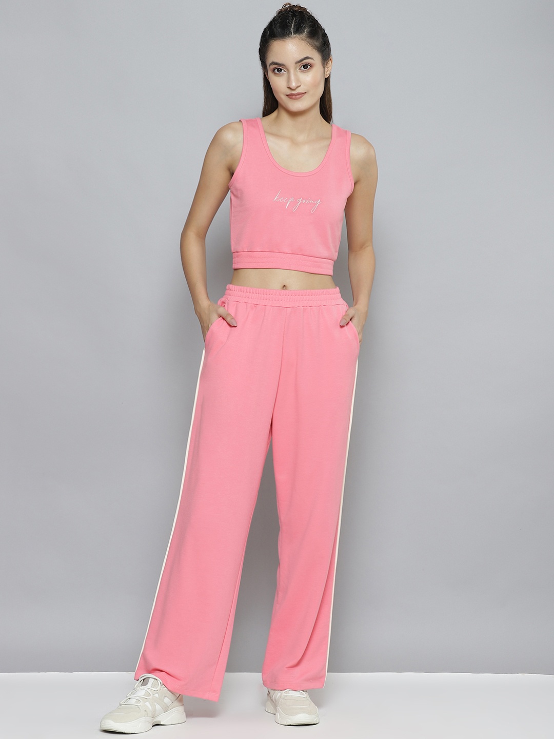 

SASSAFRAS Women Peach-Coloured Printed Crop Top & Track Pants Co-Ords