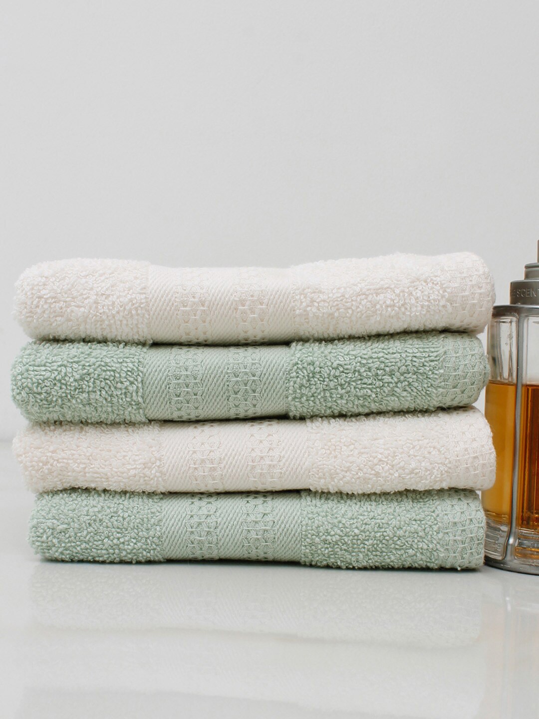 

AVI Living Pack Of 4 Ivory-White & Mint-Green 450 GSM Anti Microbial Cotton Hand Towel