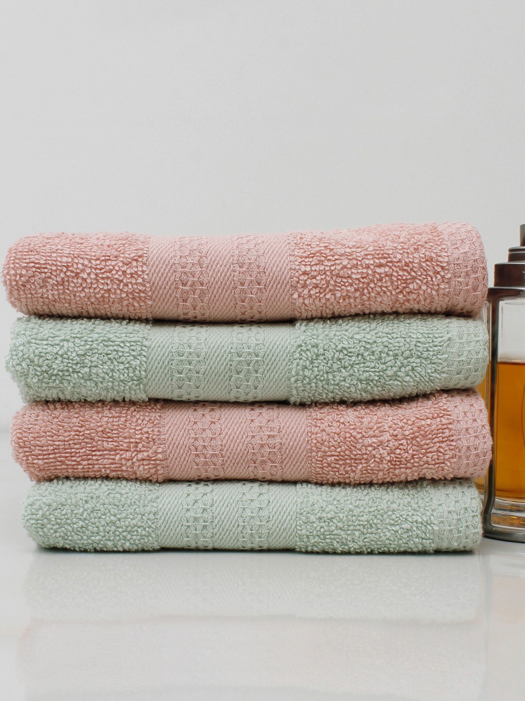 

AVI Living Set of 4 Green & Pink Solid 450 GSM Cotton Hand Towels