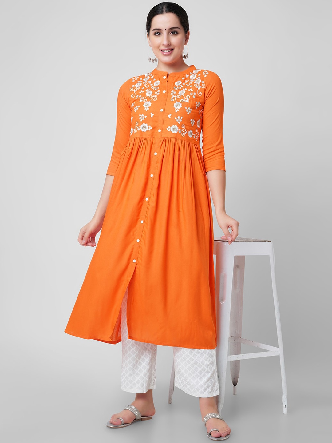 

KALINI Women Orange Quirky Yoke Design Thread Work Handloom Kurta