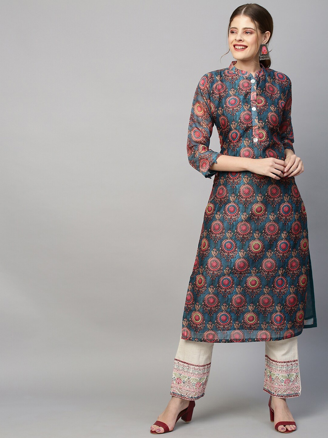 

FASHOR Women Teal Floral Sequinned Kurta with Trousers