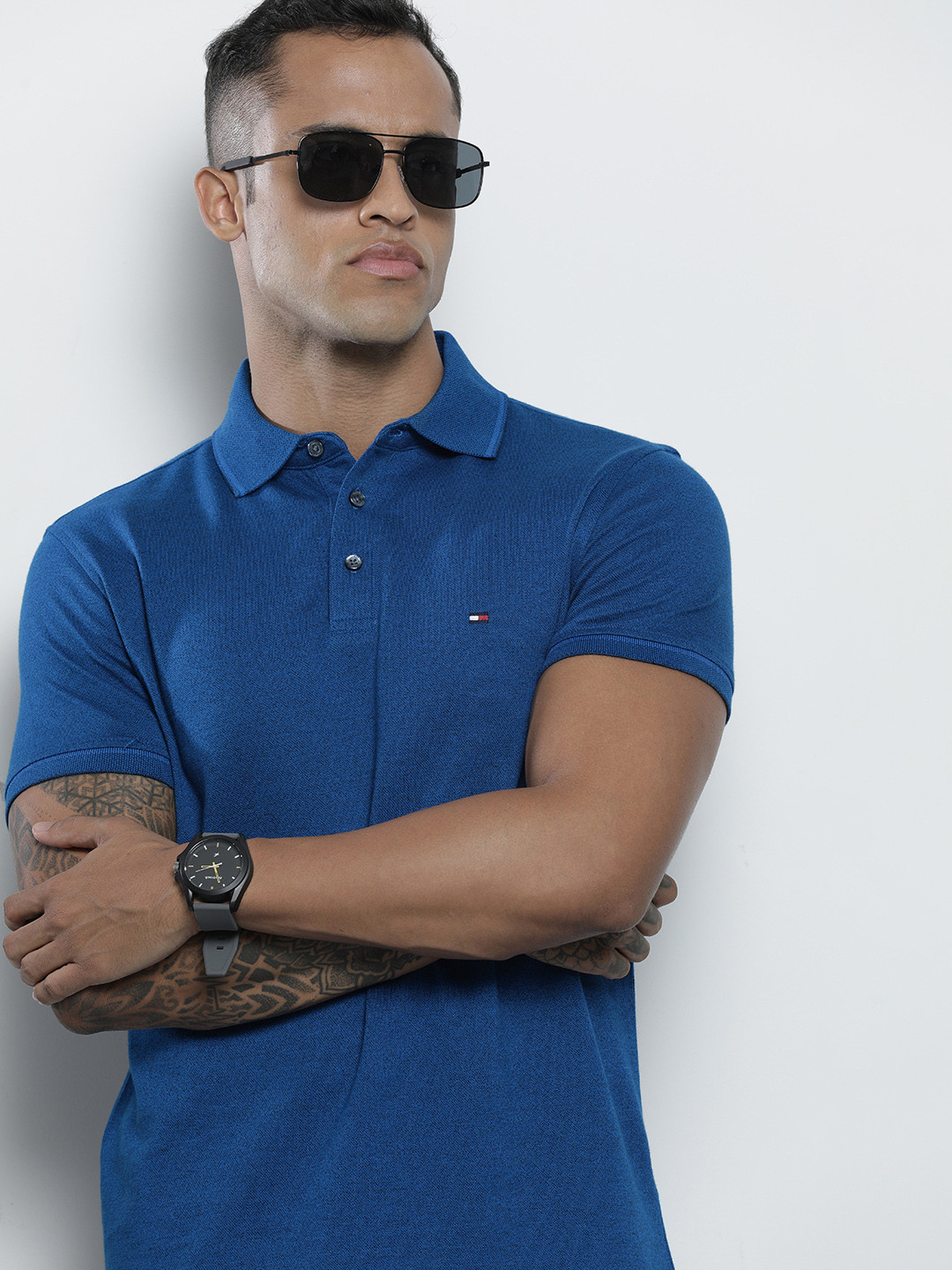 

Tommy Hilfiger Men Blue Solid Polo Collar Indigo Organic Cotton Slim Fit T-shirt