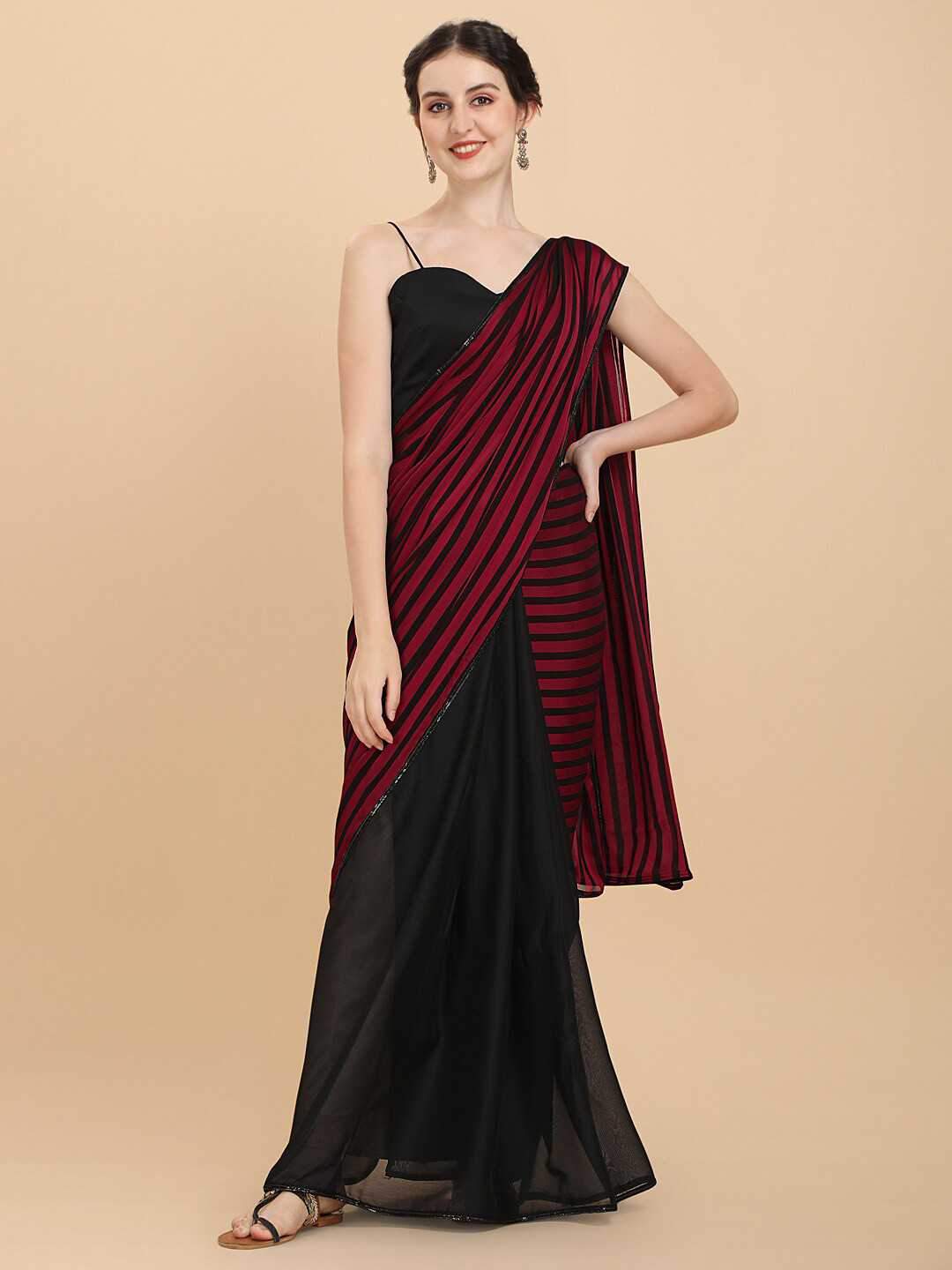 

Sangria Maroon & Black Striped Silk Blend Saree