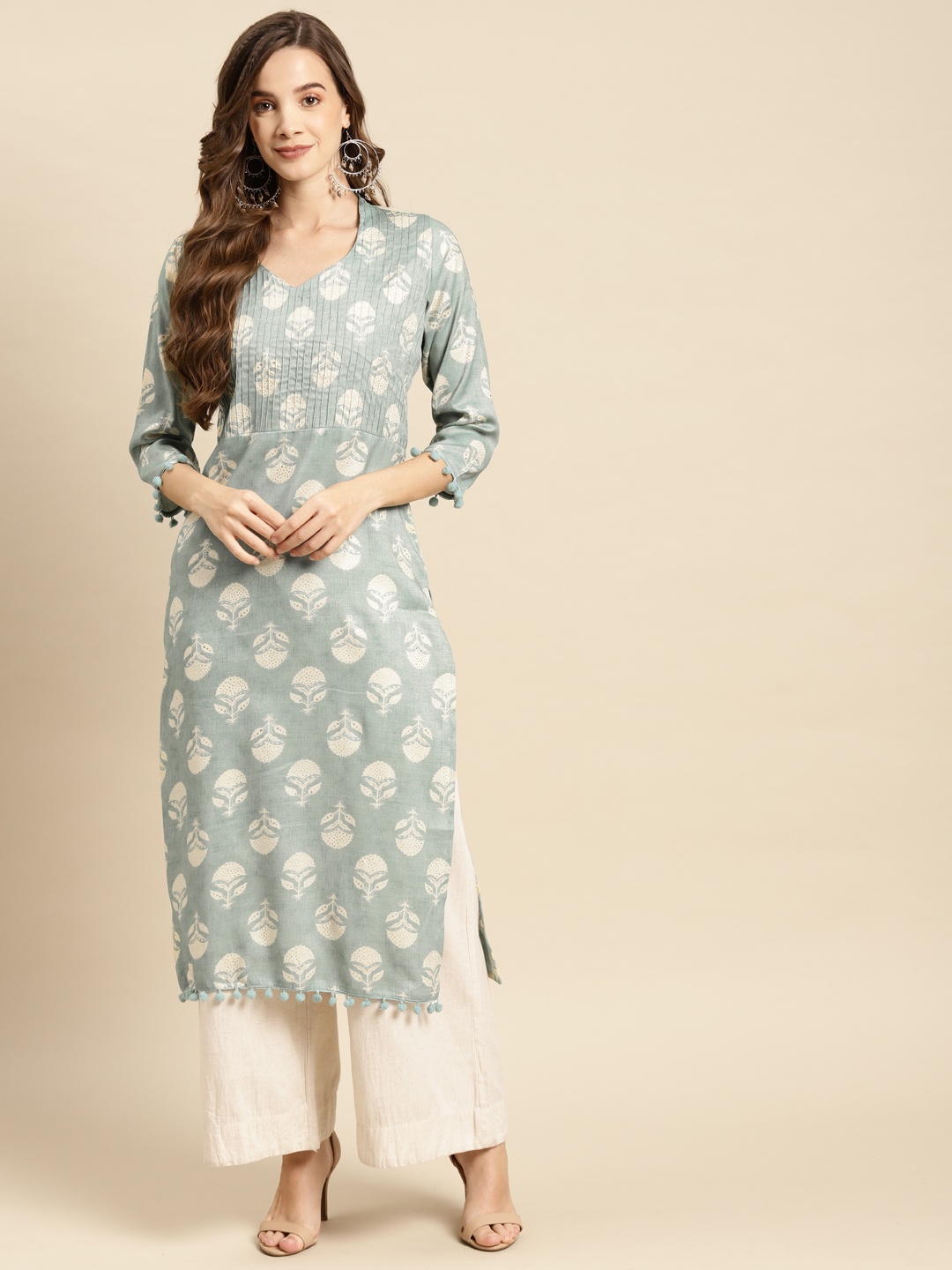 

Prakhya Women Turquoise Blue & Beige Ethnic Motifs Printed Kurta