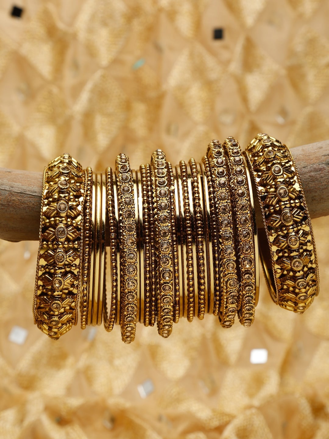 

Shining Diva Women Gold Colored Bangle