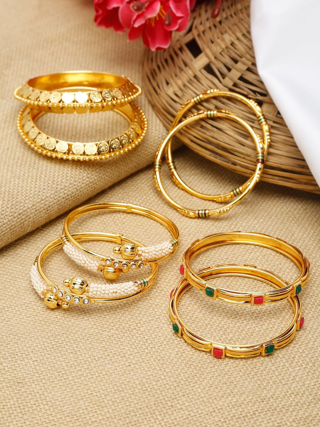 

Shining Diva Set of 8 Gold-Plated and Pearl Studded Bangles