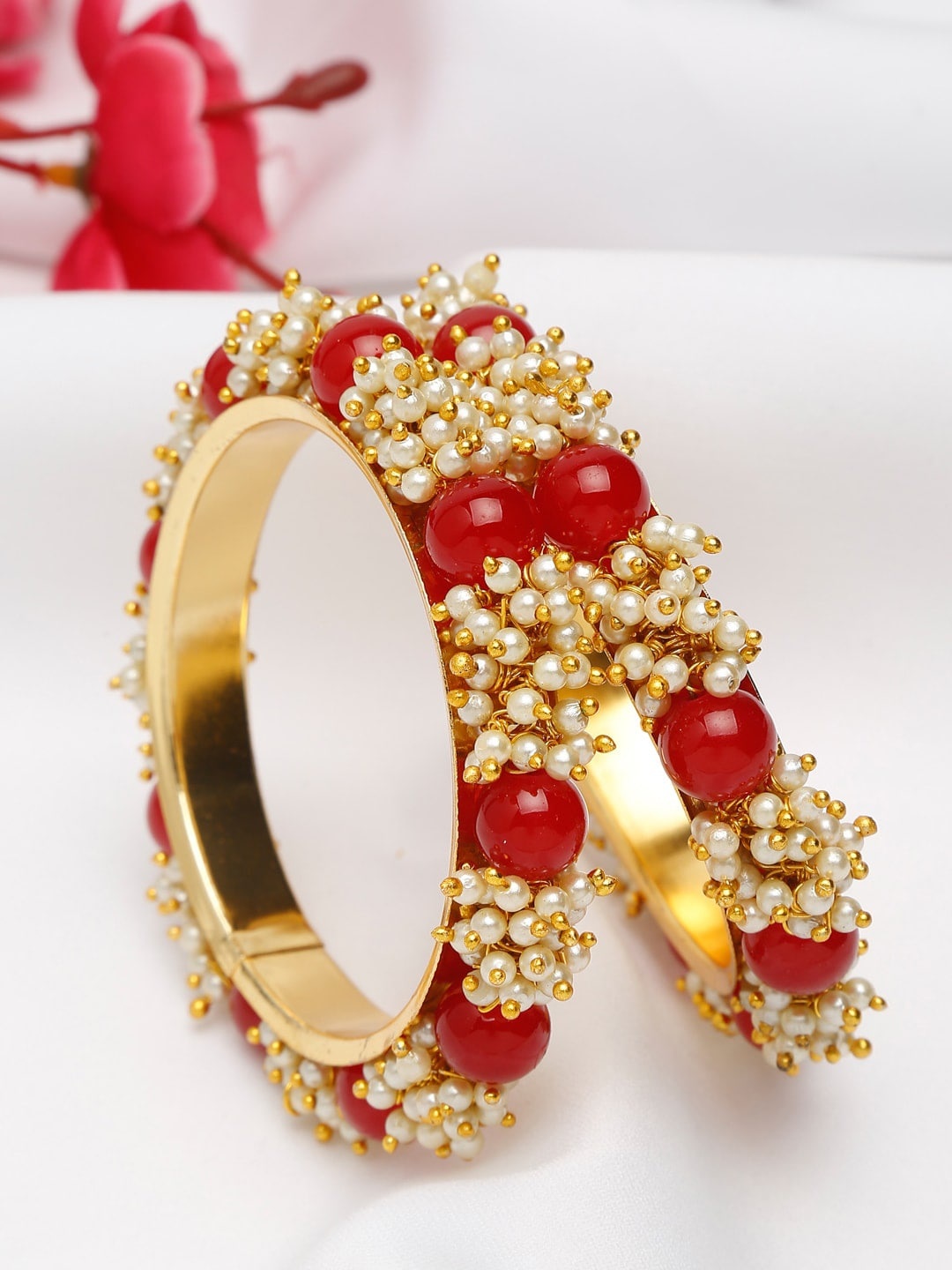 

Shining Diva Set Of 2 Gold Plated Red Pearl Studded Bangle Set