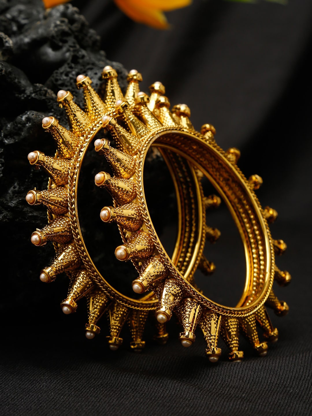 

Shining Diva Set Of 2 Gold-Plated White Pearl Beaded Antique Bangles