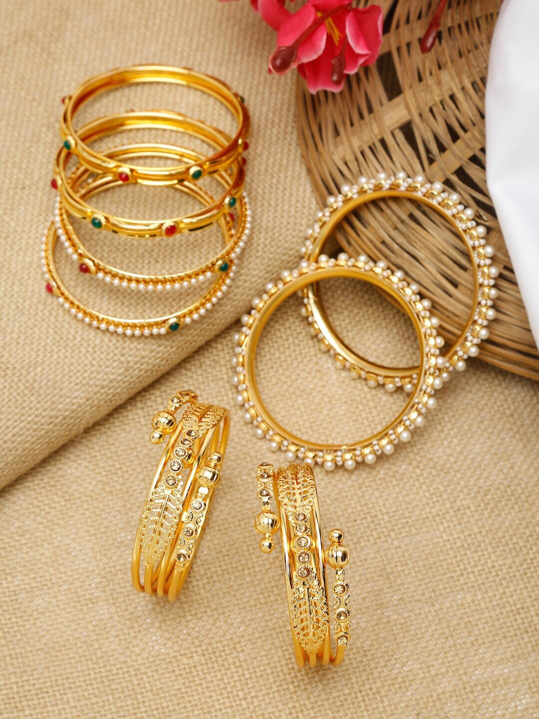 

Shining Diva Set Of 8 Gold-Plated & White Stones-Studded & Beaded Bangles