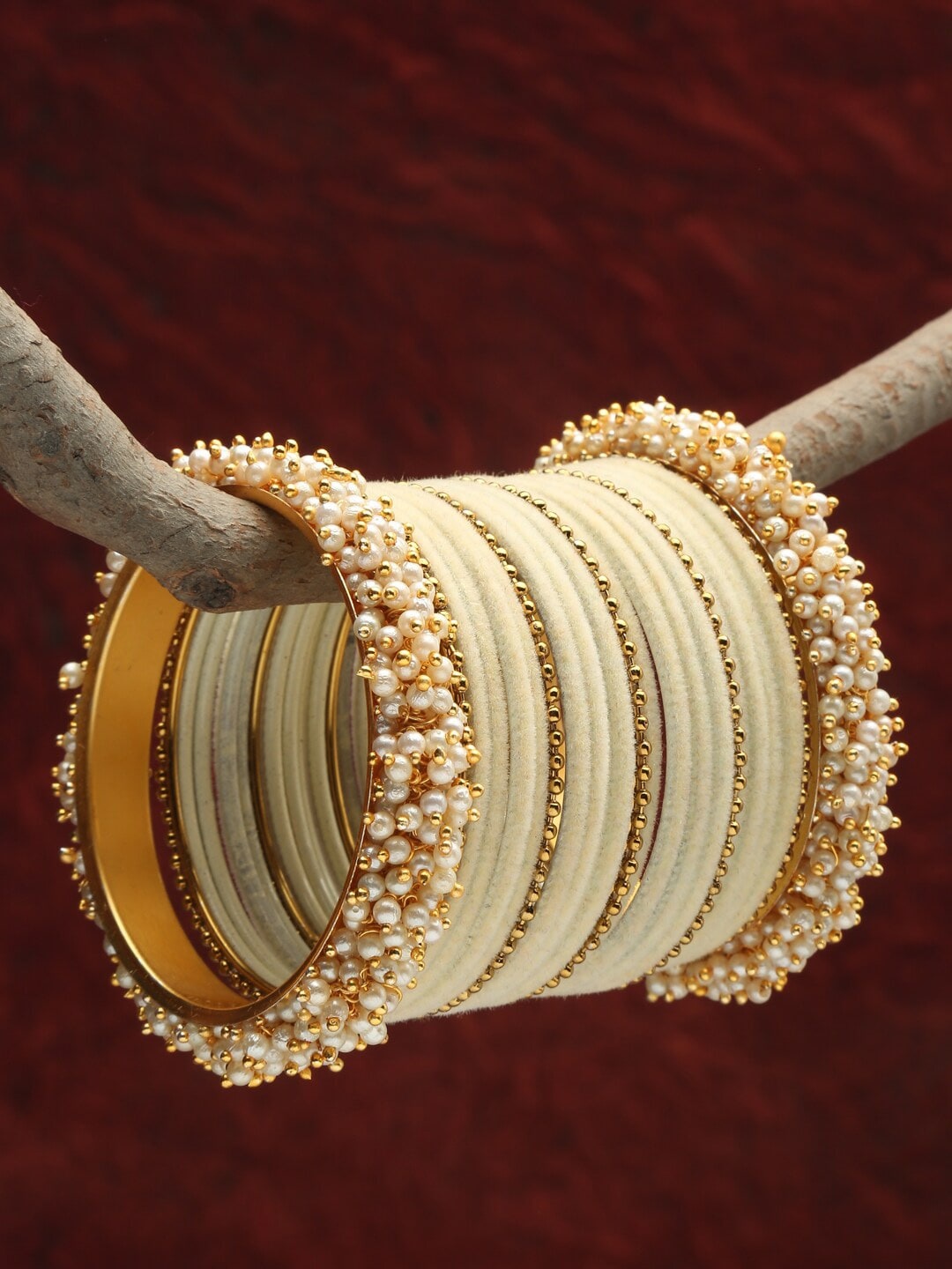 

Shining Diva Set Of 23 Gold-Plated & White Pearls Beaded Bangles