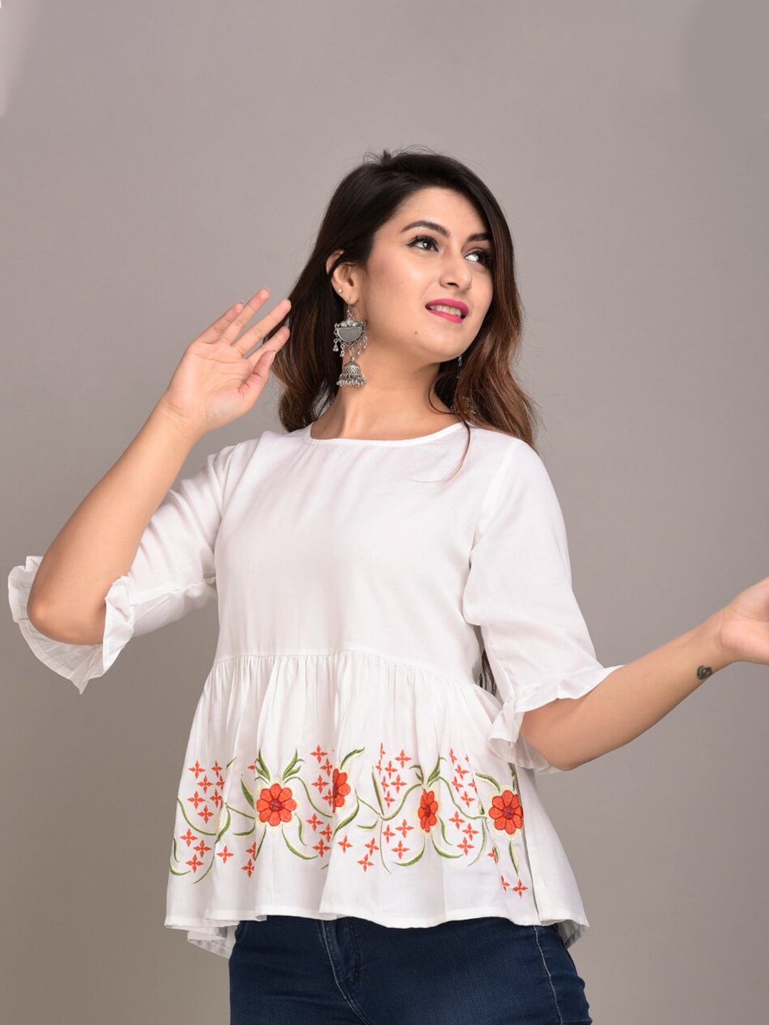 

IQRAAR White Floral Peplum Top