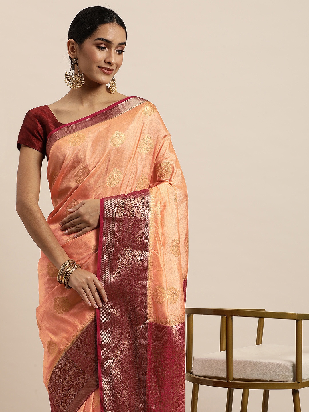 

Saree Swarg Peach-Coloured & Golden Ethnic Motifs Silk Blend Banarasi Sarees