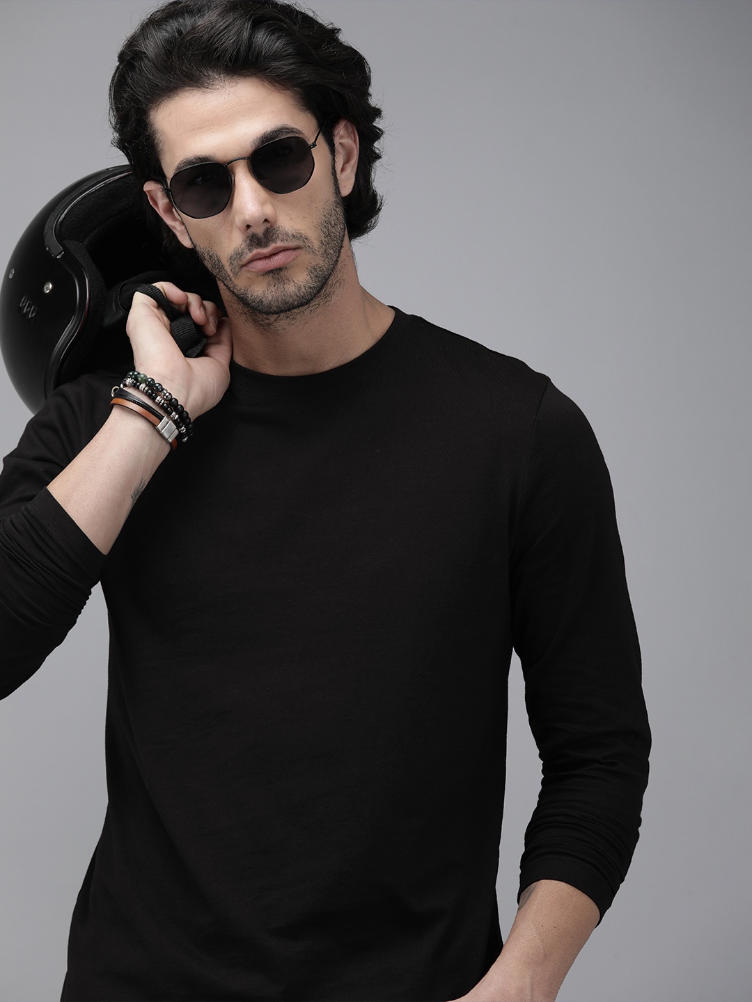 

Roadster Men Black Solid Pure Cotton T-shirt