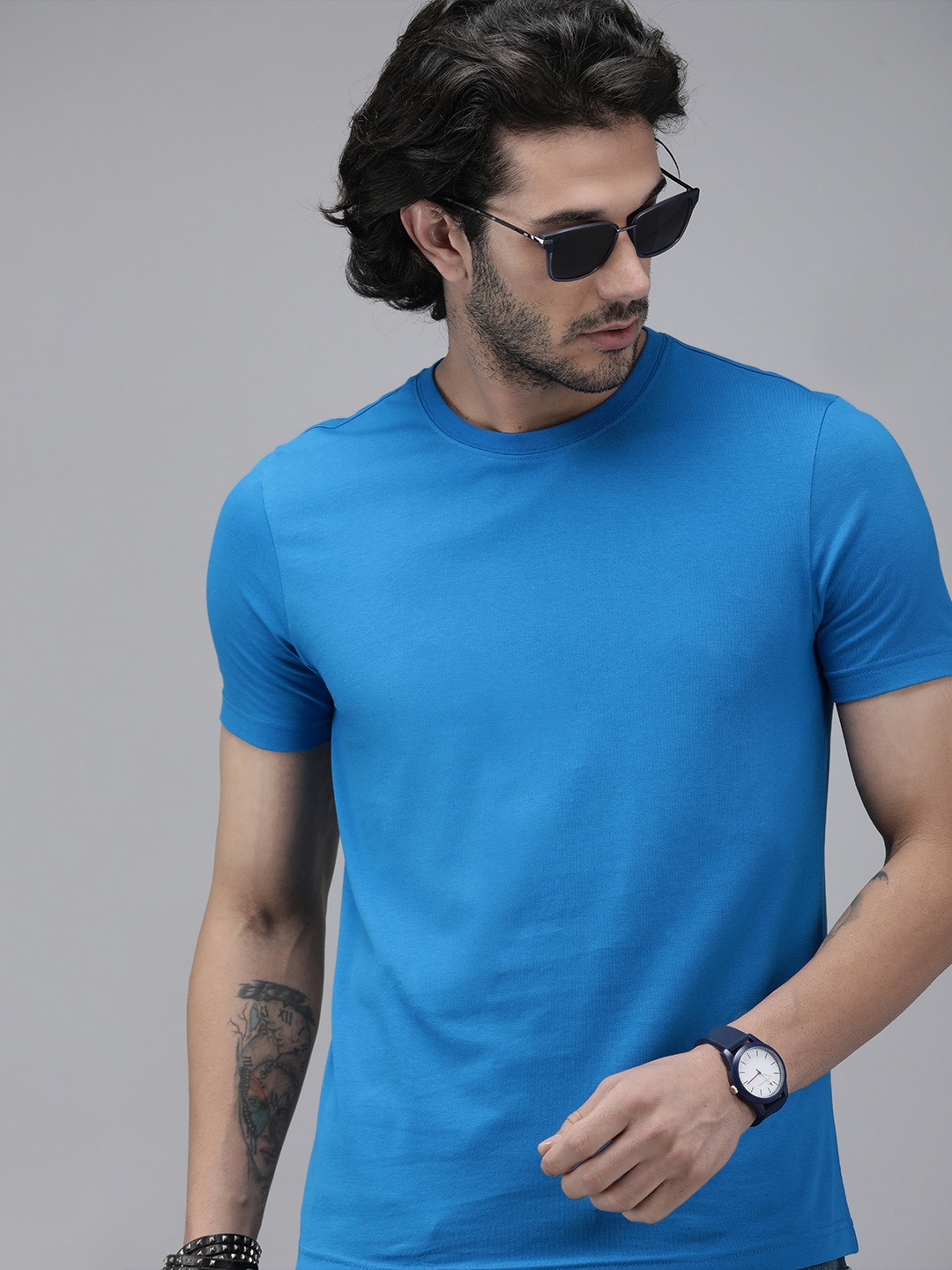 

Roadster Men Blue Solid Pure Cotton T-shirt