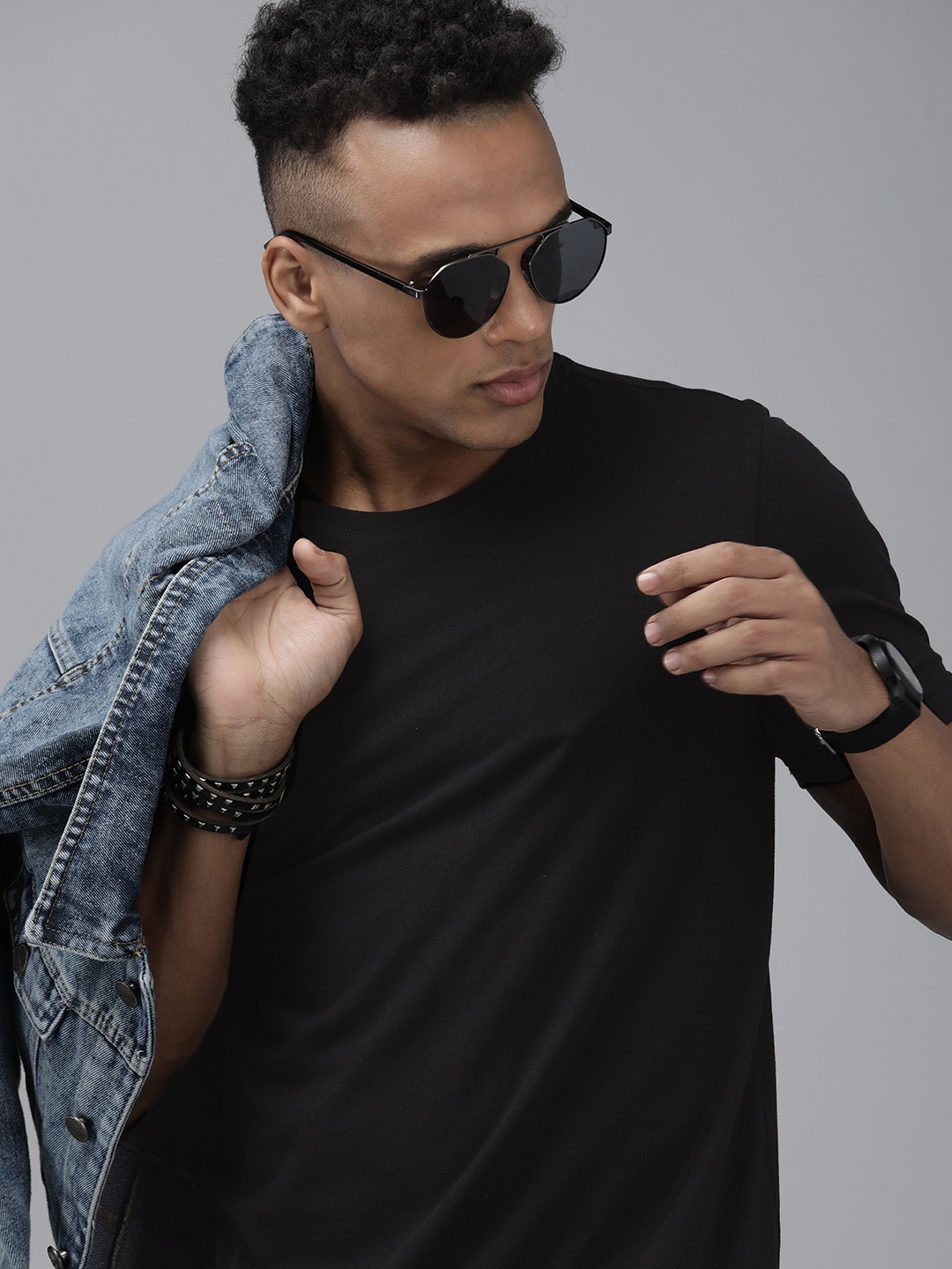 

Roadster Men Black Solid Pure Cotton T-shirt