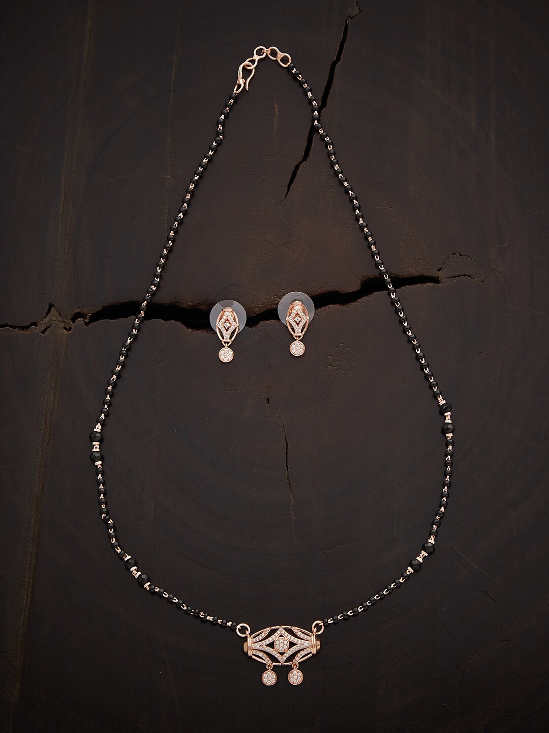 

Kushal's Fashion Jewellery Rose Gold-Plated White Stone Studded Mangalsutra