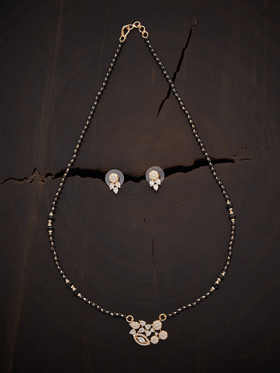 

Kushal's Fashion Jewellery Gold-Plated Black Beaded White Stone Studded Mangalsutra