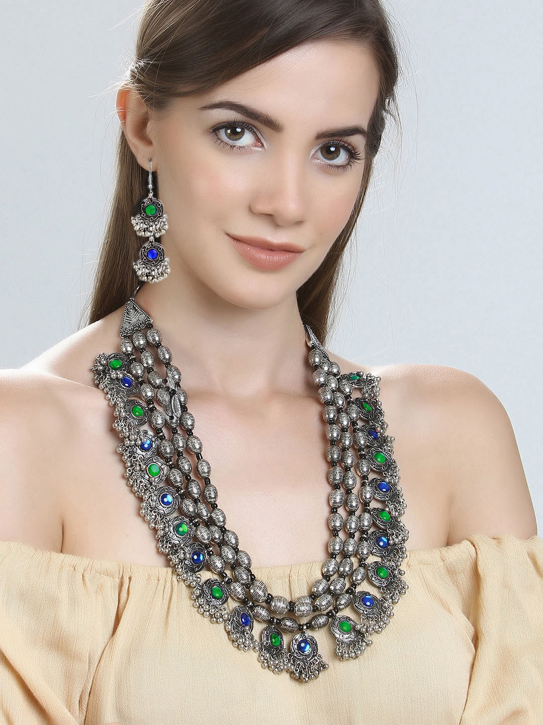 

Yellow Chimes Oxidized Silver-Plated Green & Blue Stone-Studded Jewellery Set