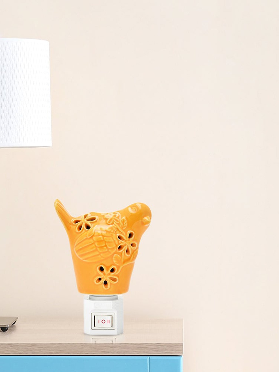 

Athome by Nilkamal Palm Leaf Mustard Yellow Cutwork Lantern