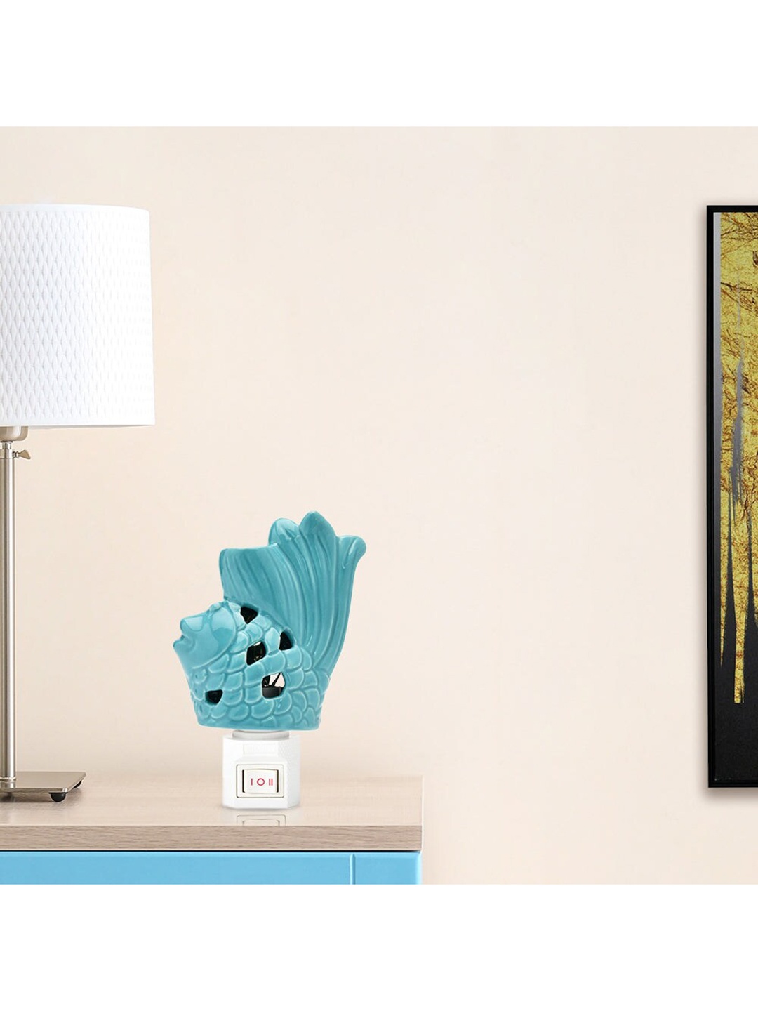 

Athome by Nilkamal Palm Leaf Sea Green Fish Shaped Cutwork Wall Lamp