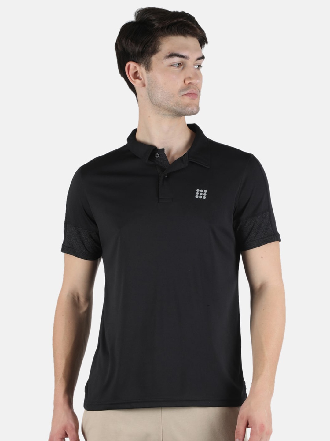 

rock it Men Black Solid Polo Collar T-shirt