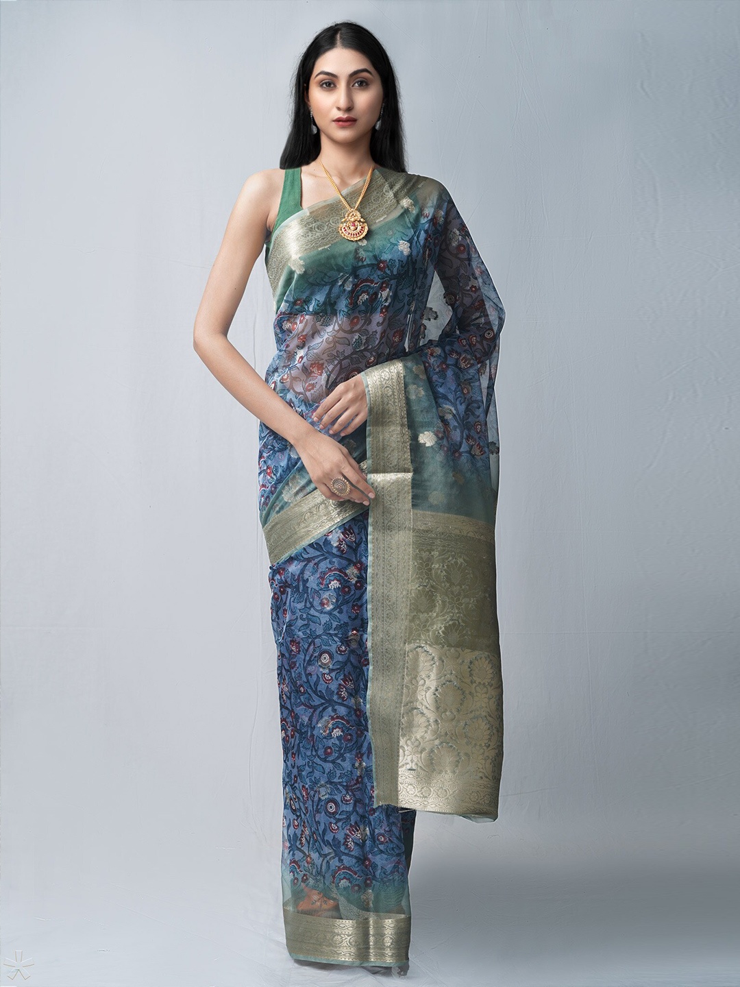 

Unnati Silks Blue & Green Floral Print Organza Saree