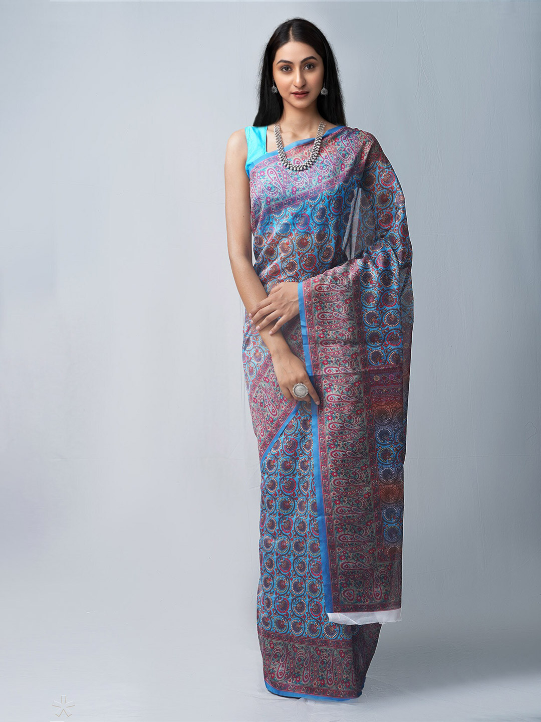 

Unnati Silks Blue & Green Ethnic Motifs Silk Cotton Chanderi Saree