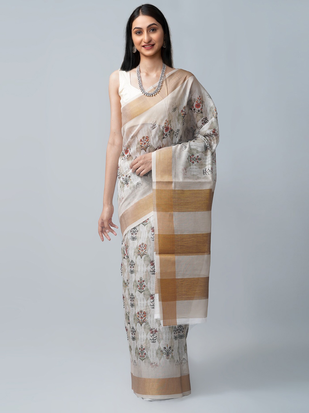 

Unnati Silks Cream-Coloured & Gold-Toned Floral Print Silk Cotton Saree