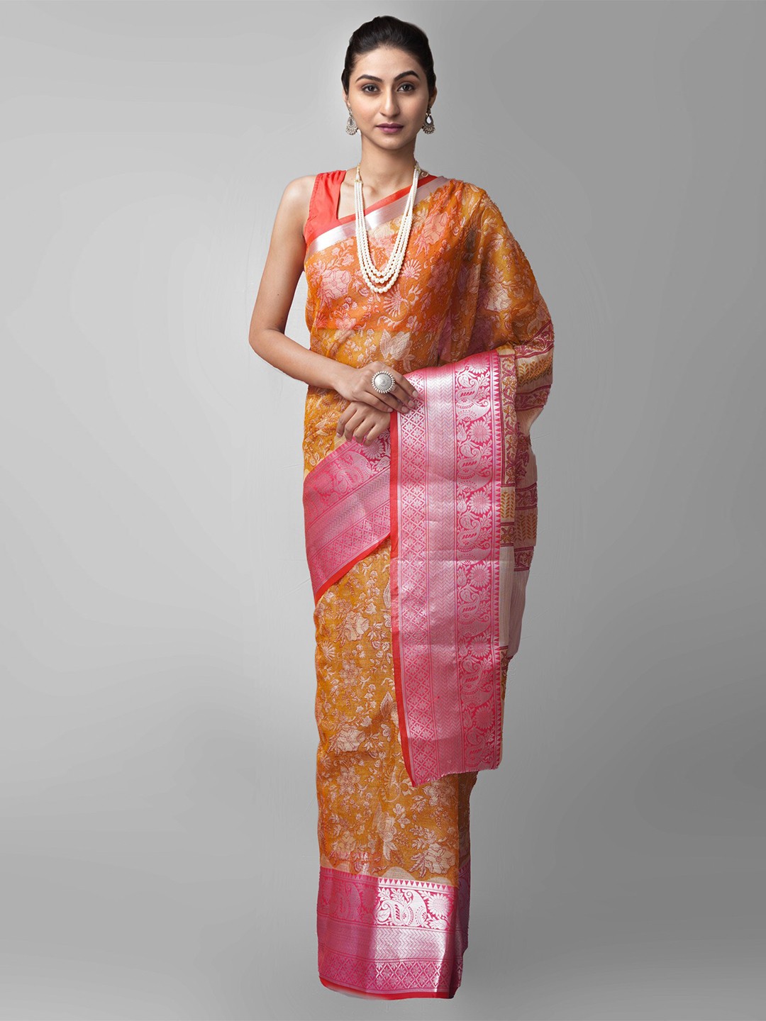 

Unnati Silks Orange & Silver Ethnic Motifs Zari Tissue Banarasi Saree