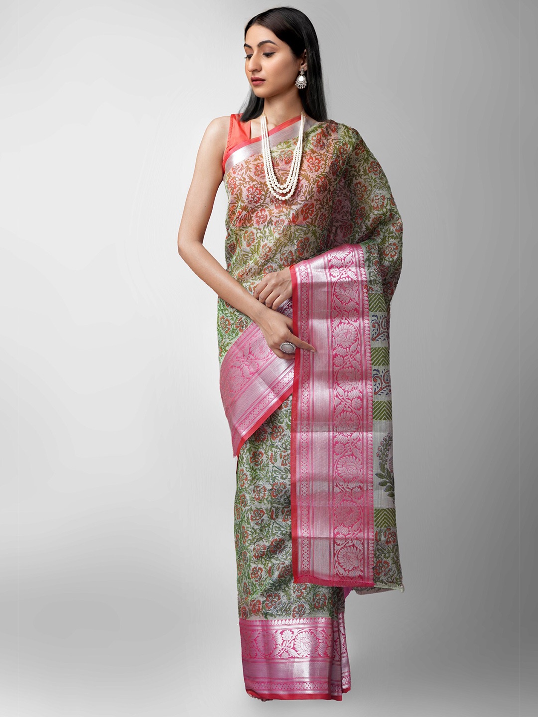 

Unnati Silks Green & Silver-Toned Ethnic Motifs Zari Tissue Banarasi Saree