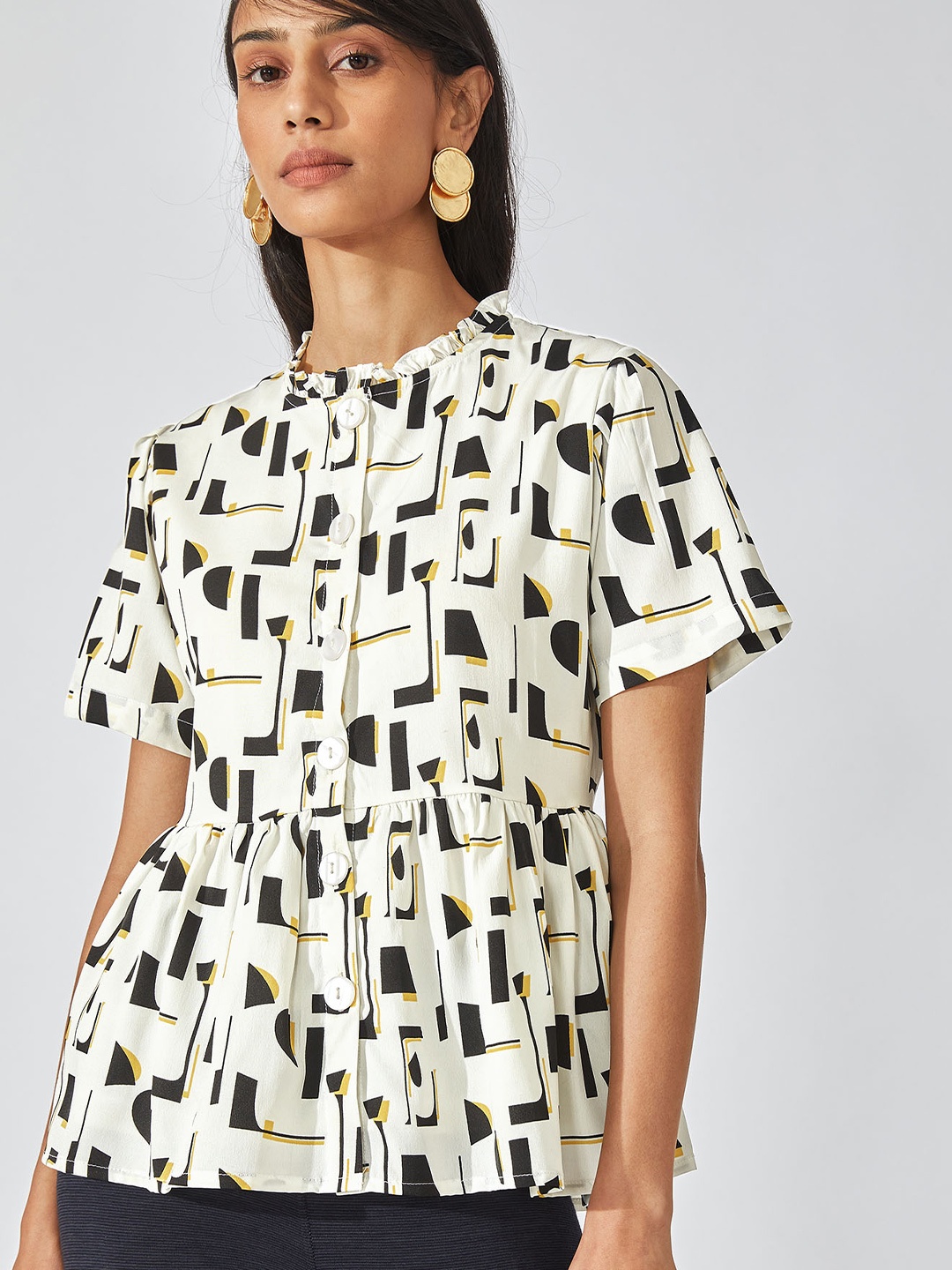 

The Label Life White Women Geometric Printed Monochrome Crepe Peplum Top