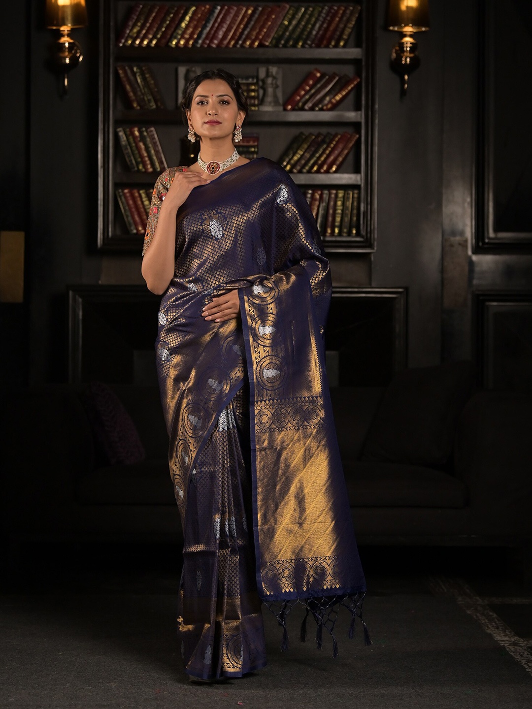 

Exclusiva Blue & Golden Woven Design Zari Silk Blend Saree