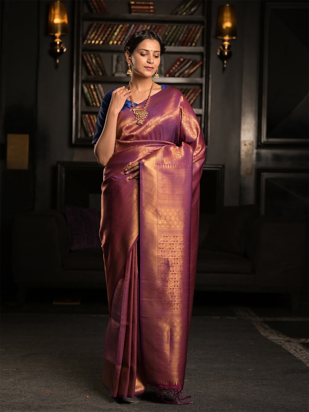 

Exclusiva Purple & Gold-Toned Woven Design Zari Silk Blend Heavy Work Saree