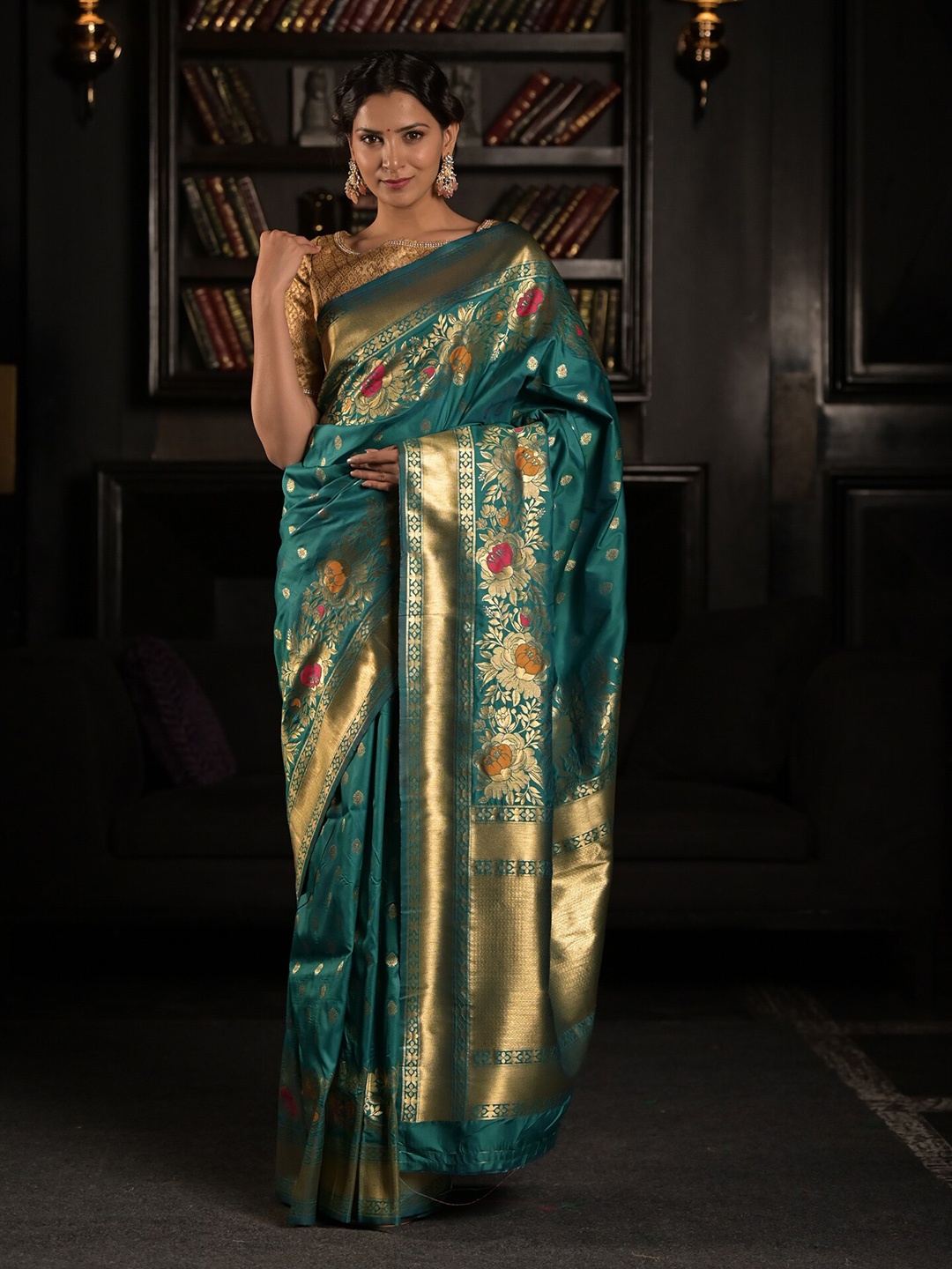 

Exclusiva Green & Golden Floral Zari Silk Blend Saree