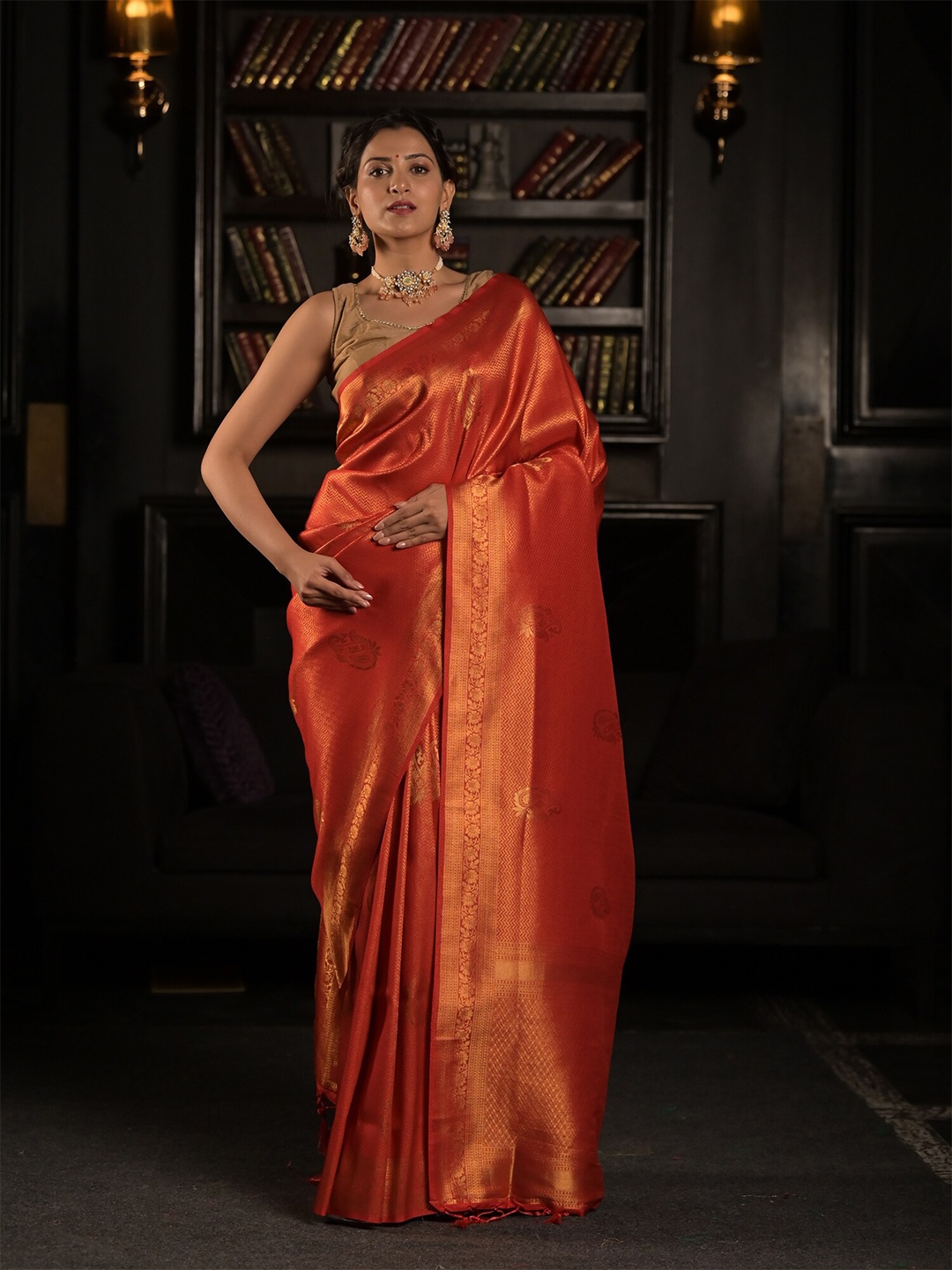 

Exclusiva Orange & Golden Woven Design Zari Silk Blend Heavy Work Saree