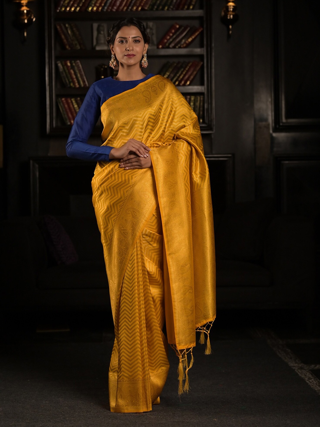 

Exclusiva Yellow & Gold-Toned Floral Zari Silk Blend Kanjeevaram Saree