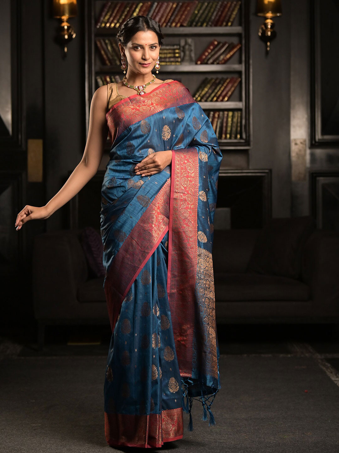 

Exclusiva Blue & Golden Woven Design Zari Silk Blend Saree