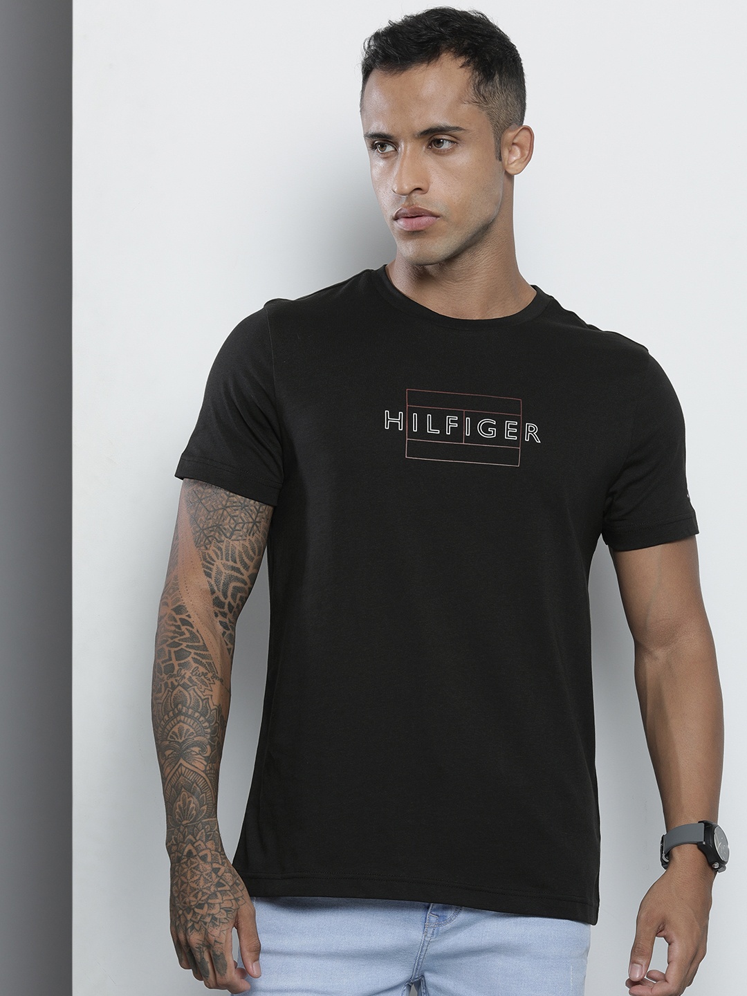 

Tommy Hilfiger Men Black Brand Logo Print Round Neck Organic Cotton Slim Fit T-shirt