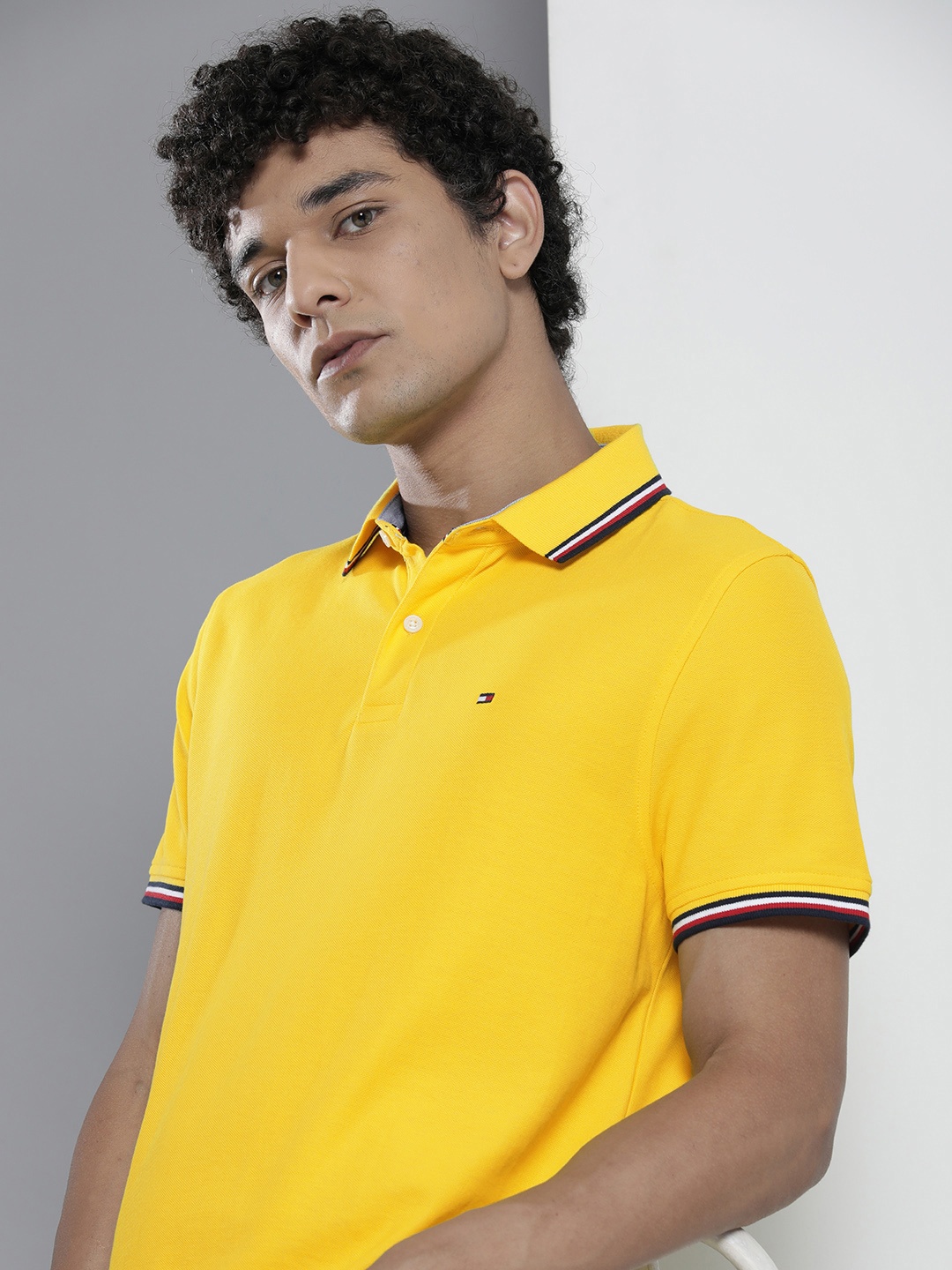 

Tommy Hilfiger Men Yellow Solid Polo Collar T-shirt