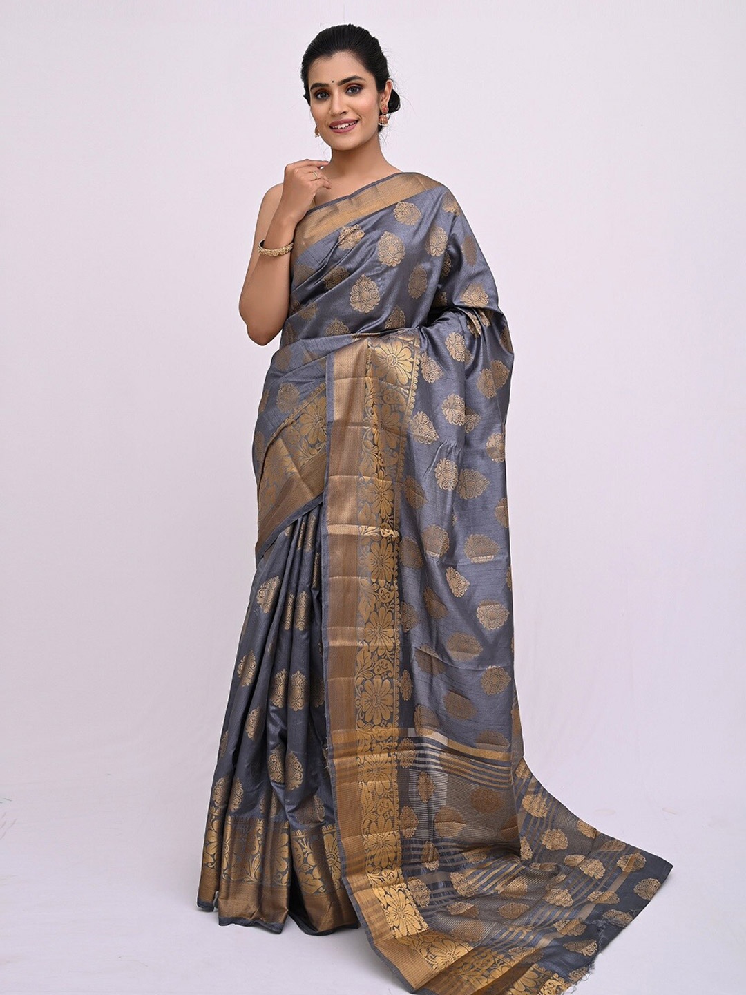 

KAJREE Grey & Golden Ethnic Motifs Zari Silk Blend Saree