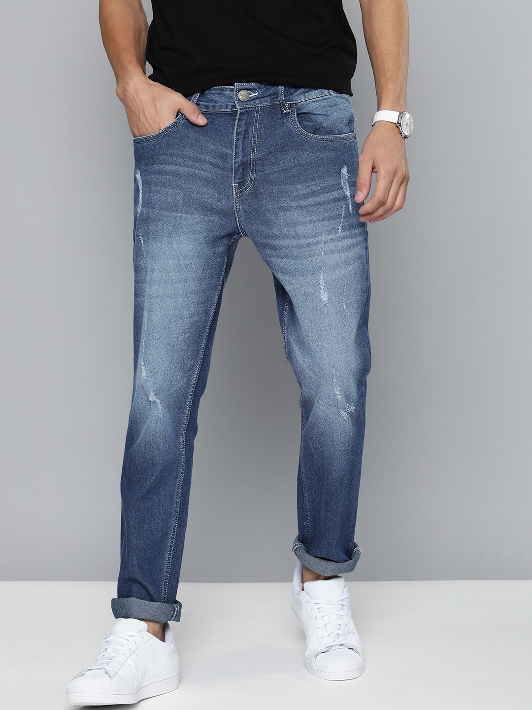 

Mast & Harbour Men Blue Skinny Fit Mildly Distressed Mid-Rise Light Fade Stretchable Jeans