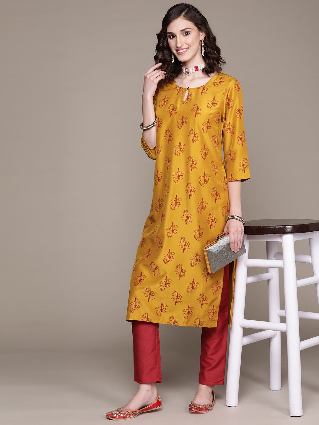 

ZIYAA Women Mustard Yellow Floral Printed Kurta with Trousers