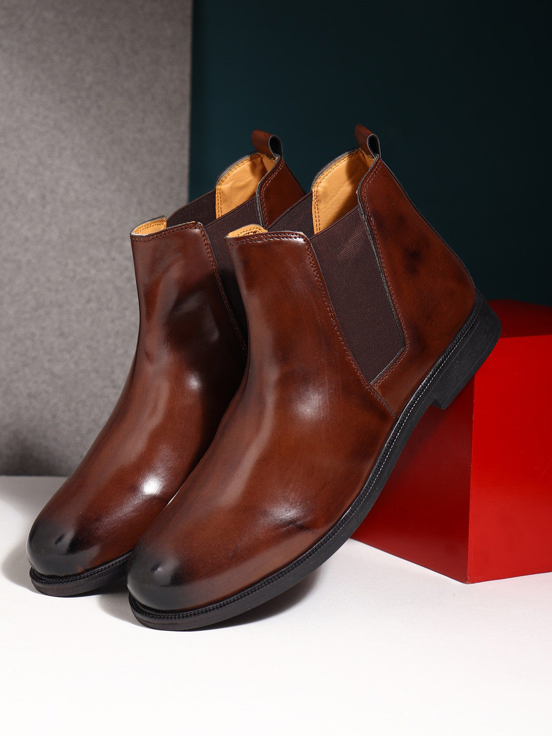 

Apsis Men Brown Solid Mid-Top Chelsea Boot