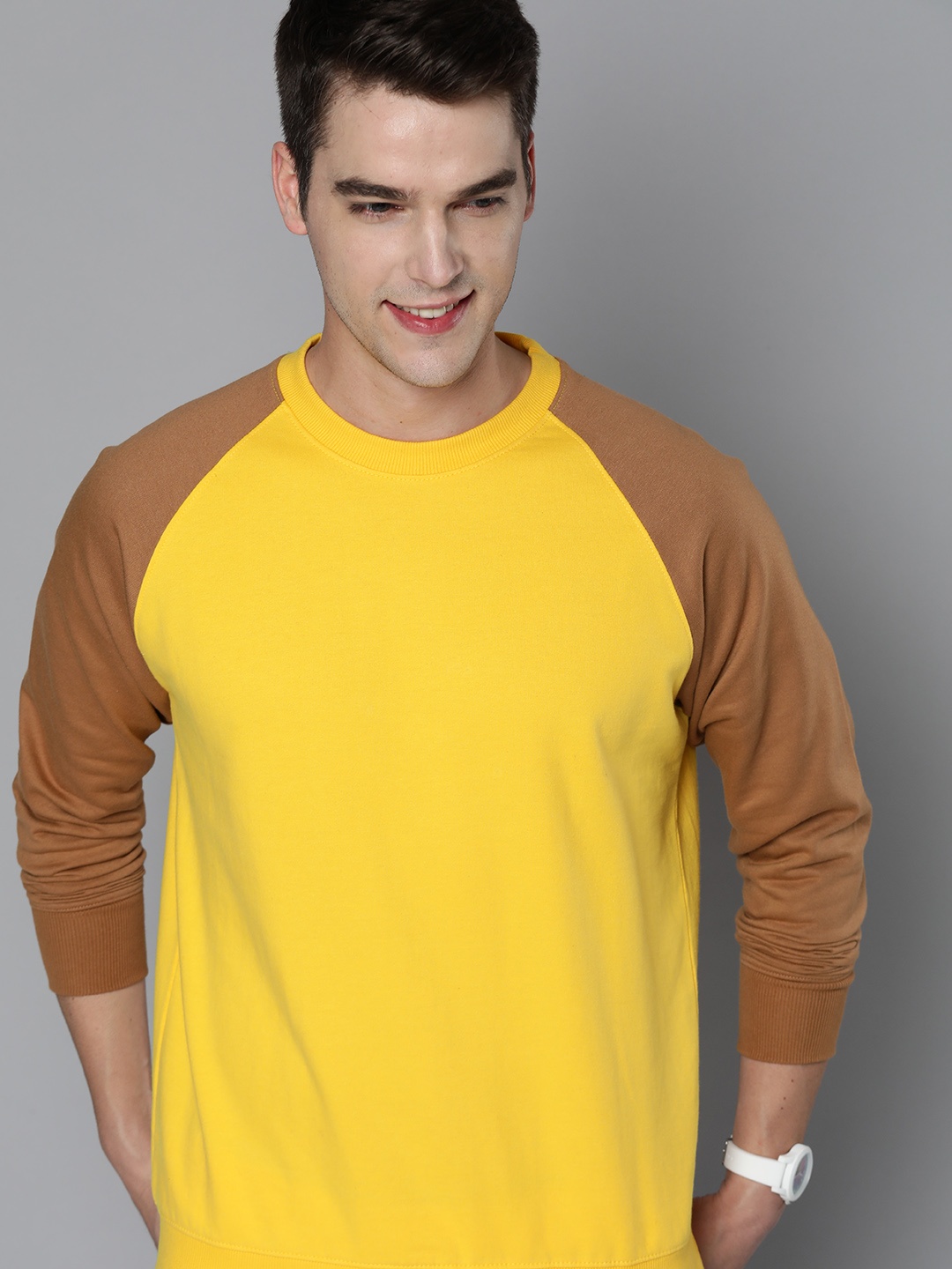 

HERE&NOW Men Yellow Solid Sweatshirt