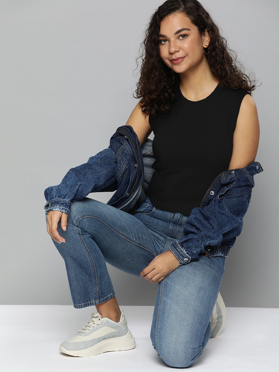 

HERE&NOW Women Black Solid Round-Neck Sleeveless Crop Pullover Sweater