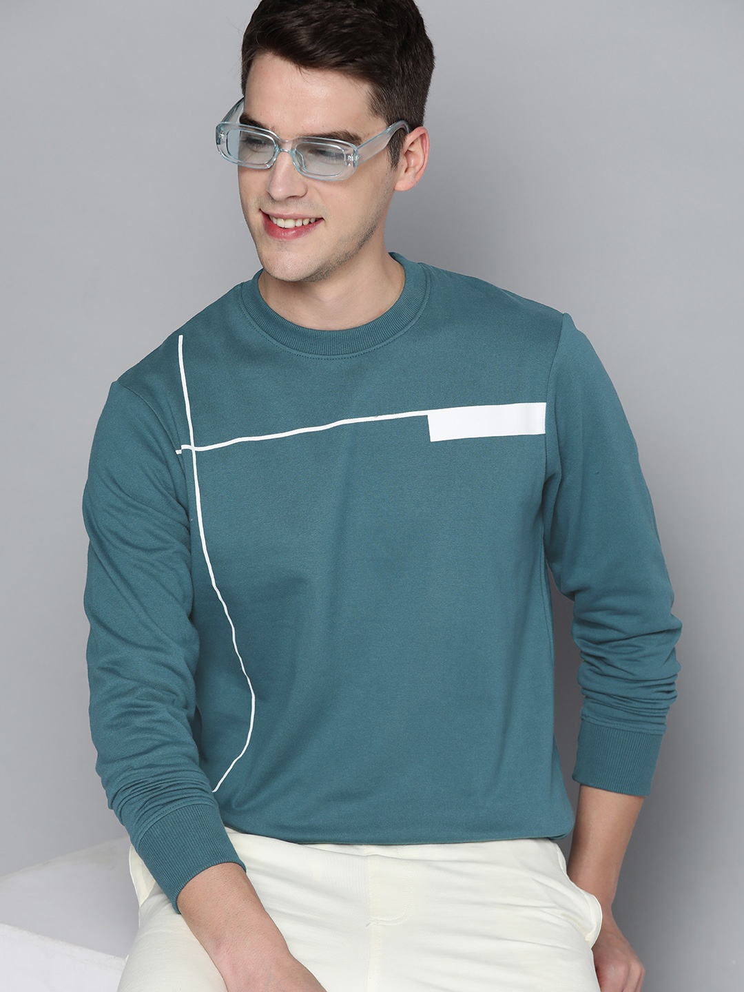 

HERE&NOW Men Blue Solid Sweatshirt