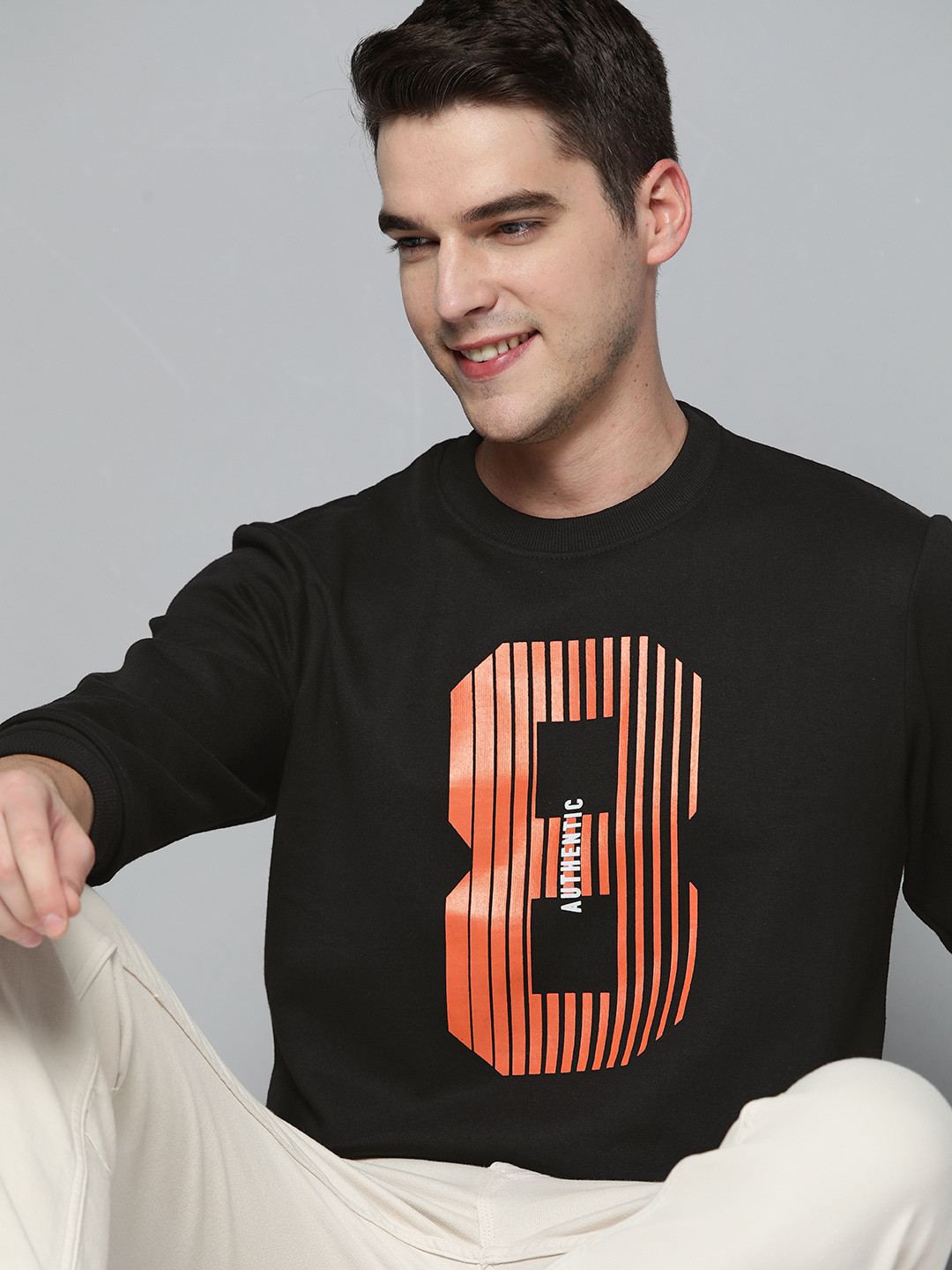 

HERE&NOW Men Black & Orange Printed Sweatshirt