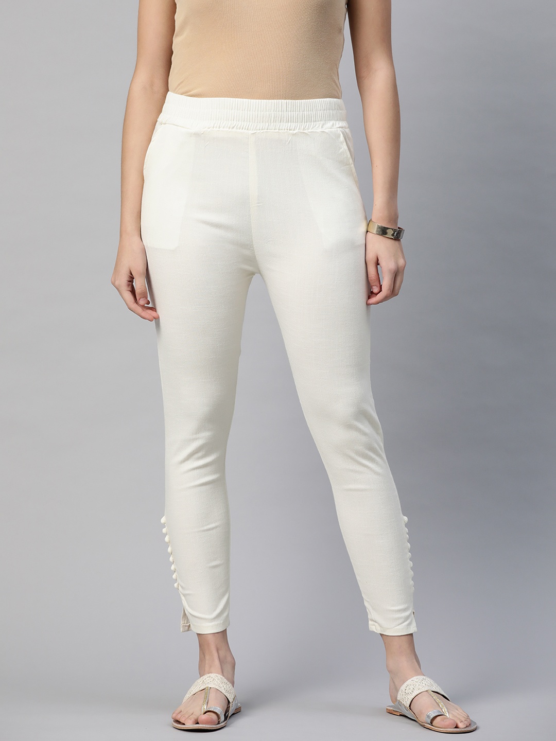 

INDYES Women Off White Solid Pure Cotton Slim Fit Trousers