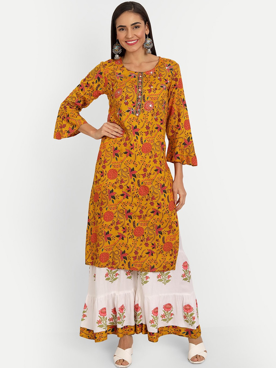

SINGNI Women Mustard Yellow Floral Printed Panelled Kurti with Palazzos