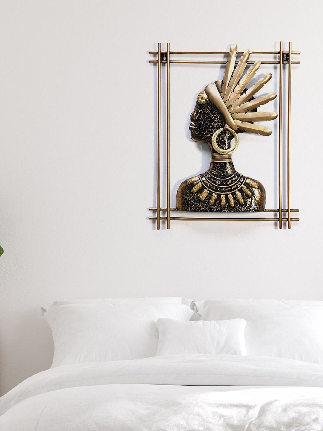 

Athome by Nilkamal Gold-Toned & Black Textured Tribal Queen Wall Decor